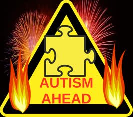 Warning sign reading 'Autism ahead' in red, bold letters in front of a background of fireworks and 2 fire emojis in the foregound. Chaotic visuals
